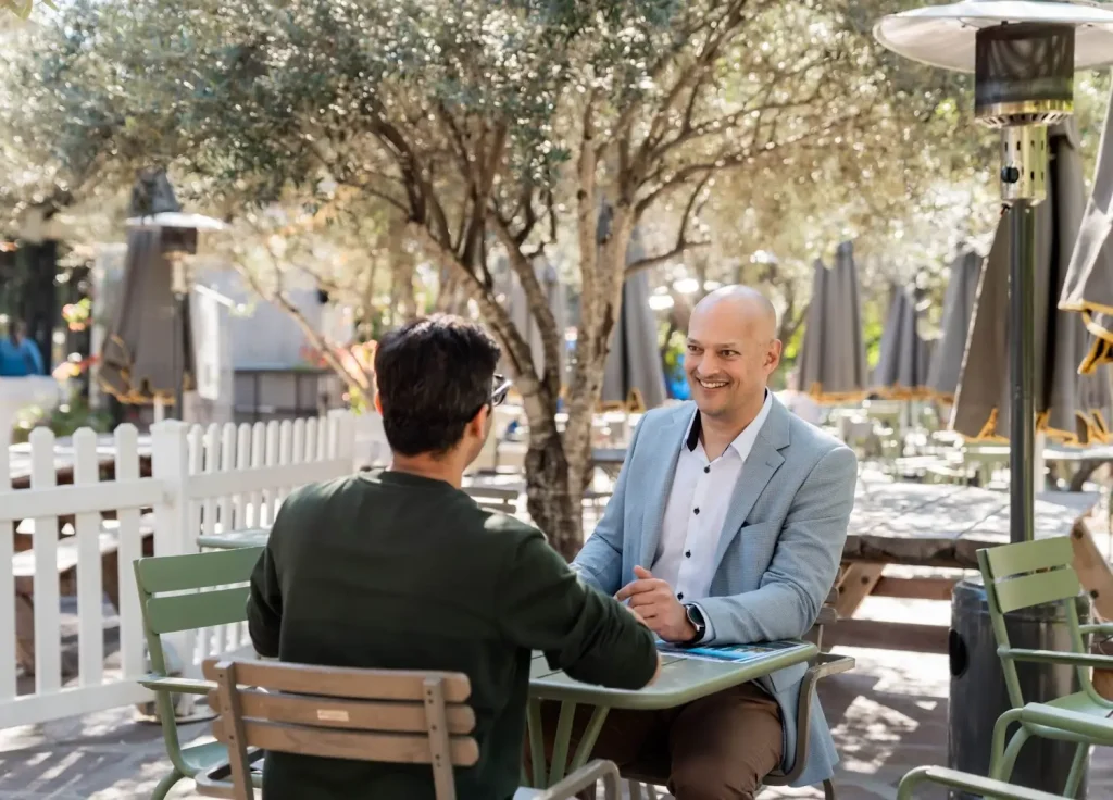 about us - Karl and a client